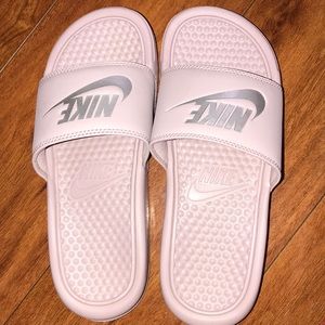 Rose gold and Silver Nike Slides .